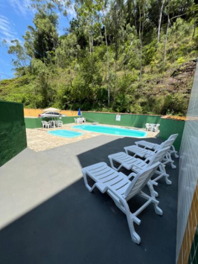 Kitnet com 2 piscinas a 4 quarteirões da Praia das Toninhas Ubatuba-SP